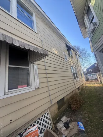 a view of a house with a door and wooden floor
