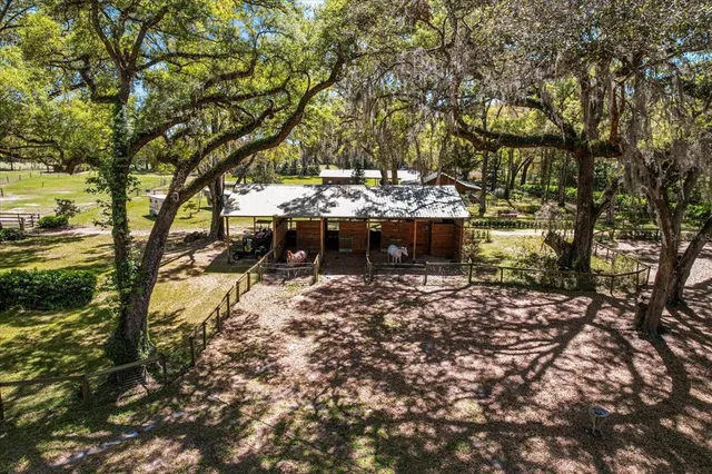 a view of a swimming pool with an outdoor space and seating area