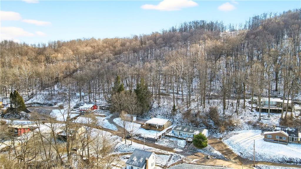 447 Lake Road Addison, PA 15411 - Photo 14 of 47 a view of a house with a yard