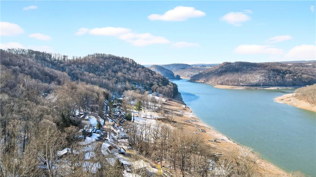 447 Lake Road Addison, PA 15411 - Photo 20 of 47 a view of a lake with mountains in the background