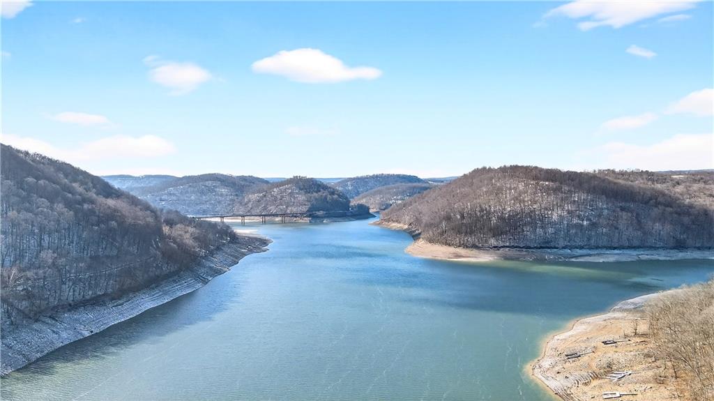 447 Lake Road Addison, PA 15411 - Photo 22 of 47 a view of a lake in middle of the house