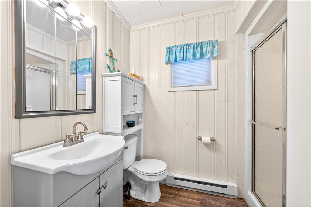 447 Lake Road Addison, PA 15411 - Photo 42 of 47 a bathroom with a sink toilet and shower