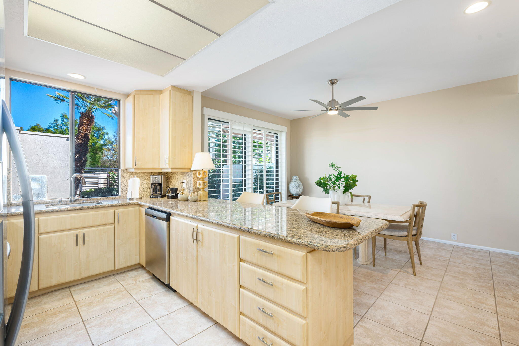 717 Inverness Drive Rancho Mirage, CA 92270 - Photo 13 of 46 a kitchen with appliances cabinets and furniture
