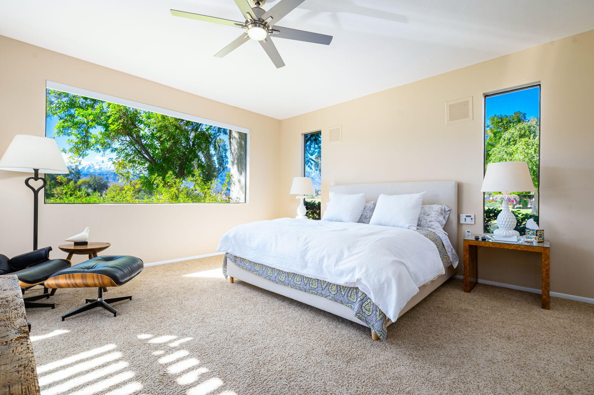 717 Inverness Drive Rancho Mirage, CA 92270 - Photo 18 of 46 a bedroom with a bed and a window