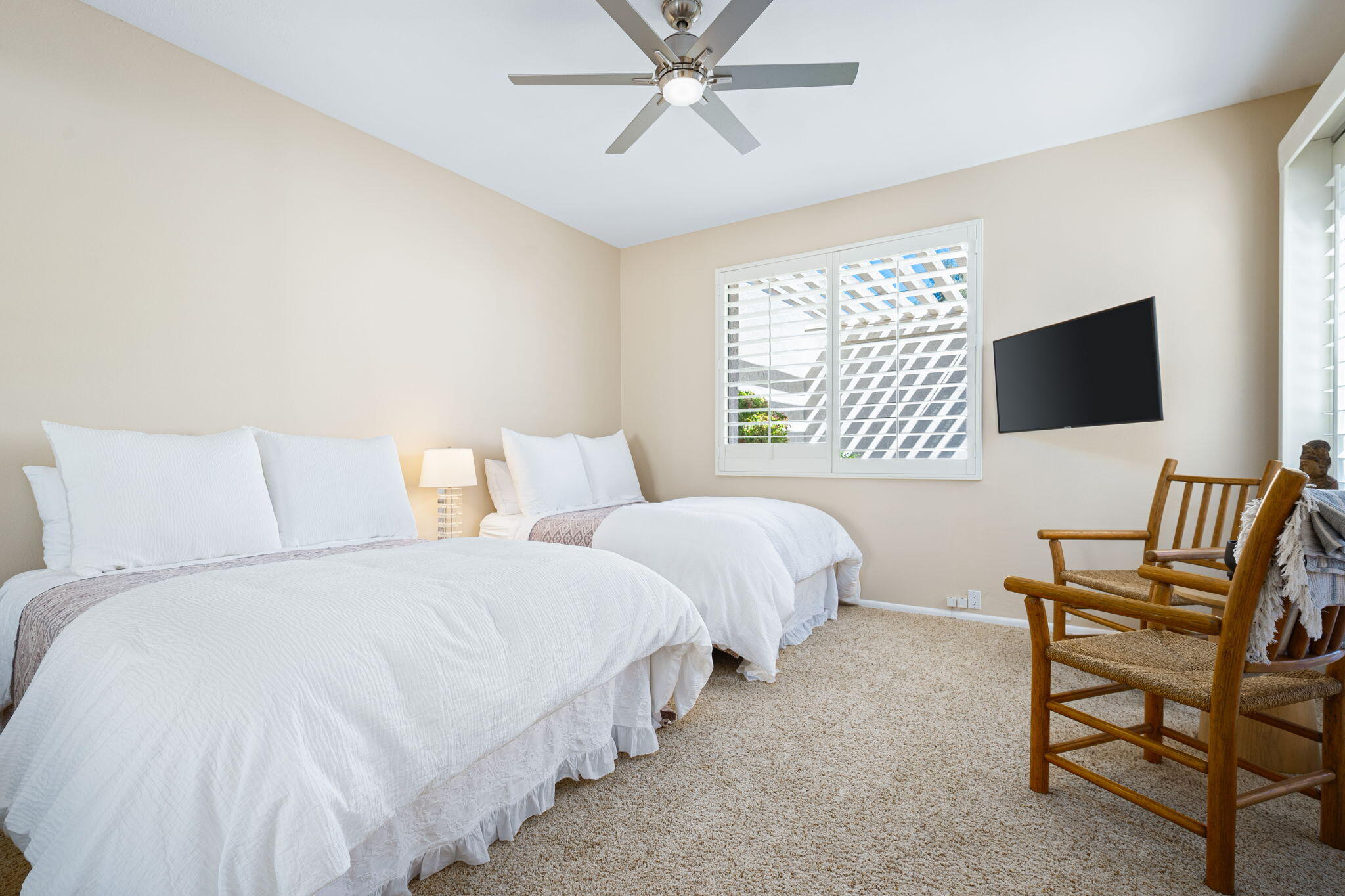 717 Inverness Drive Rancho Mirage, CA 92270 - Photo 25 of 46 a bedroom with two beds and a flat screen tv