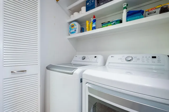 a view of yard with swimming pool and table and chairs