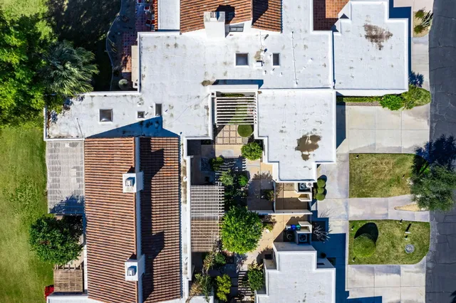 a view of a patio with couches table and chairs