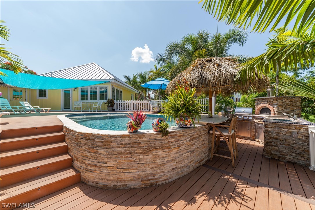 7146 Congdon Road Fort Myers, FL 33908 - Photo 23 of 50 a view of a house with backyard and sitting area
