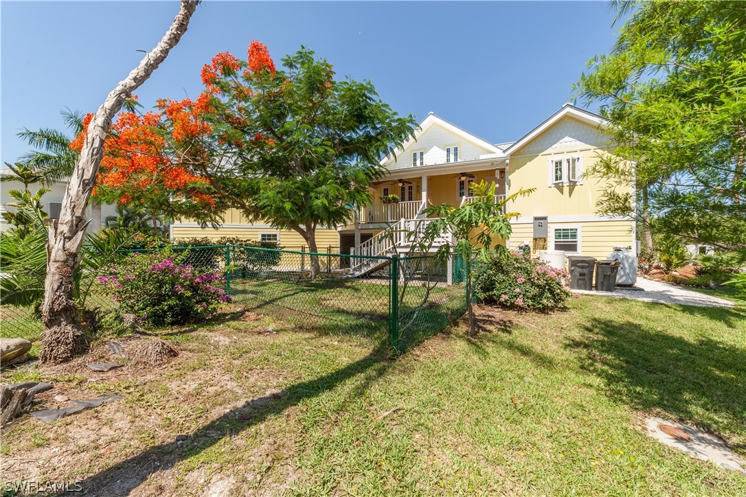 7146 Congdon Road Fort Myers, FL 33908 - Photo 40 of 50 a view of a house with a yard