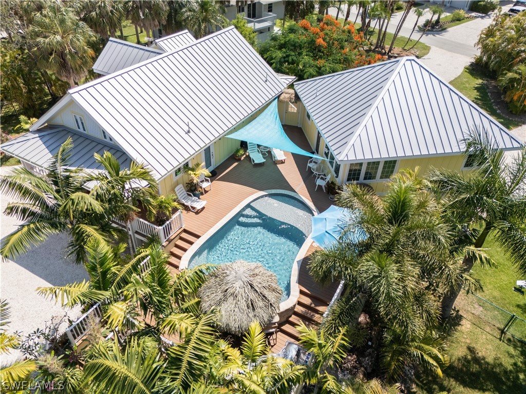 7146 Congdon Road Fort Myers, FL 33908 - Photo 41 of 50 a aerial view of a house with a yard and garden