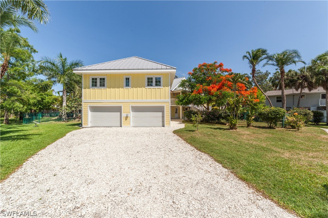 7146 Congdon Road Fort Myers, FL 33908 - Photo 43 of 50 a front view of house with yard