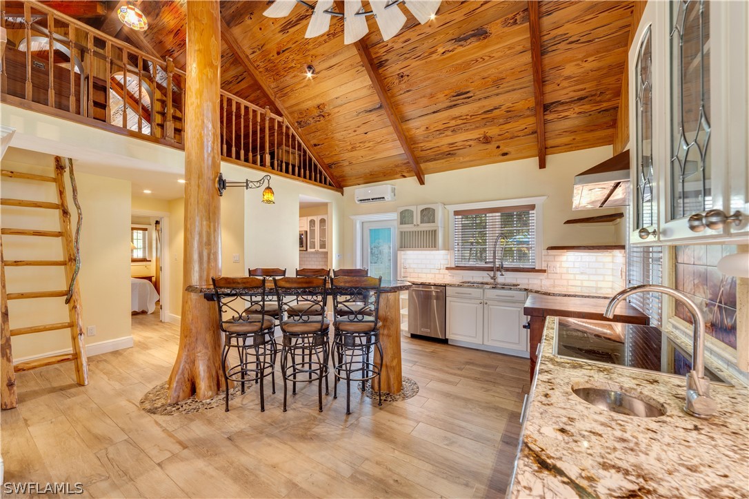 7146 Congdon Road Fort Myers, FL 33908 - Photo 8 of 50 a kitchen with lots of counter top space and dining table