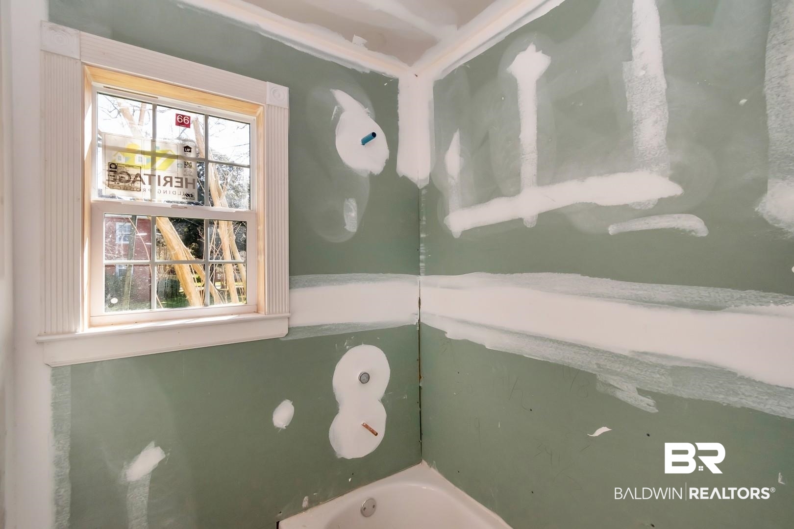 214 Upham Street, Unit 4A Mobile, AL 36607 - Photo 19 of 23 Bathroom featuring a tub to relax in