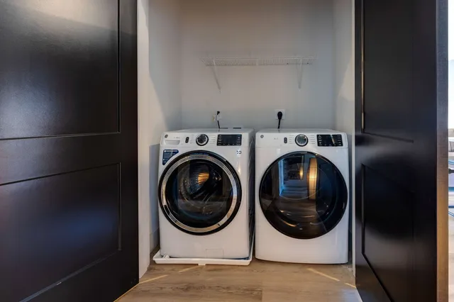 a utility room with dryer and washer