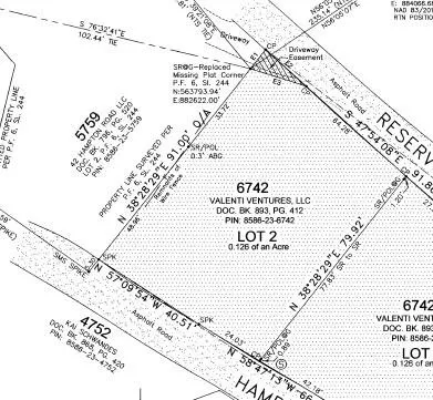 a view of yard with swimming pool and trees