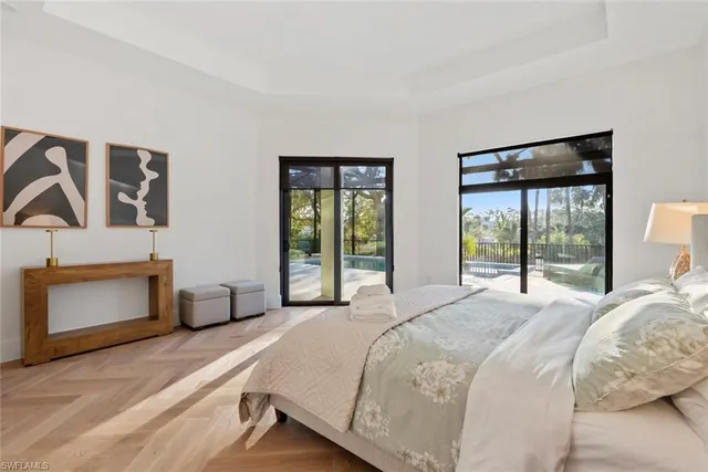 a bedroom with a bed and a fireplace