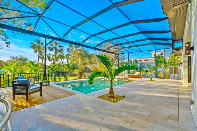 a view of yard with patio