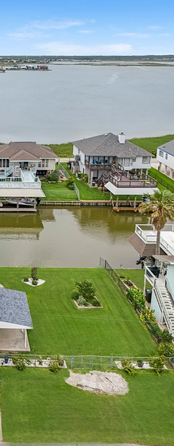 6 North Flamingo Street La Marque, TX 77568 - Photo 5 of 6 a view of a lake with houses in the back