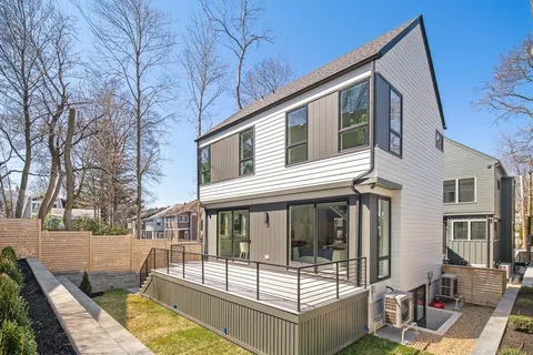 a view of a house with a roof deck