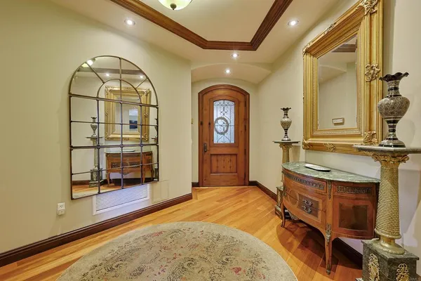 a view of a livingroom with furniture and bathroom