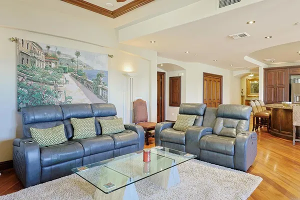 a living room with furniture and a rug