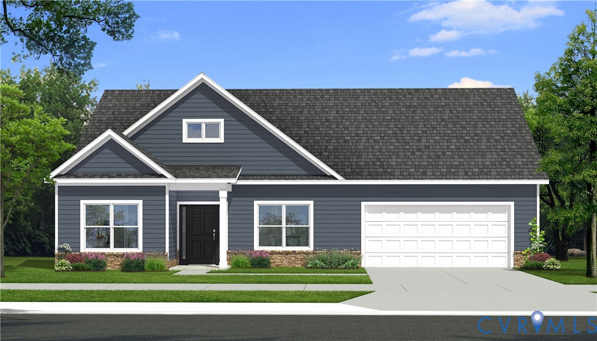 a front view of a house with a small yard and potted plants