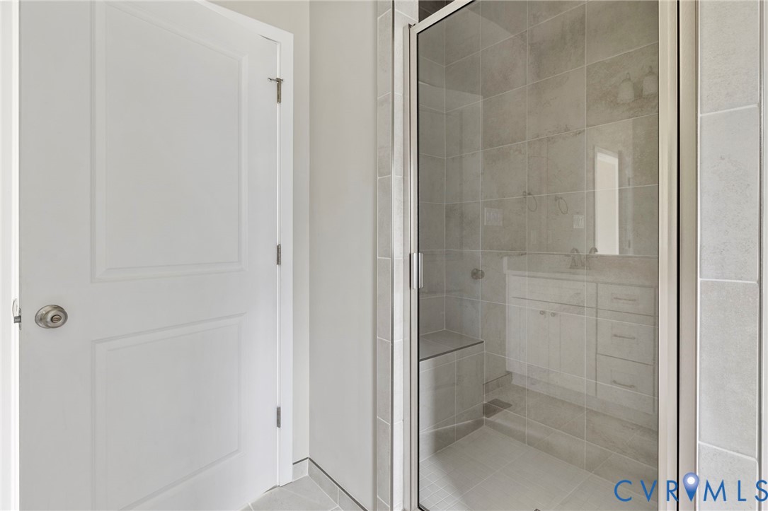 8201 Excaliber Place North Chesterfield, VA 23237 - Photo 6 of 12 a bathroom with a granite countertop shower