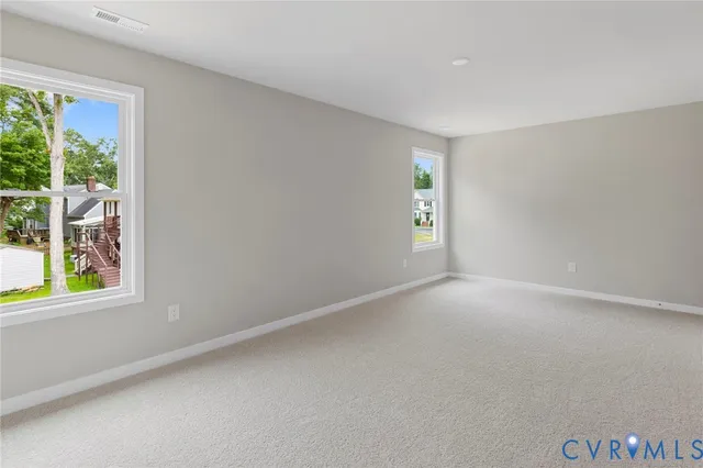 an empty room with windows