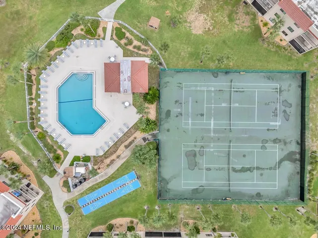 an aerial view of a swimming pool