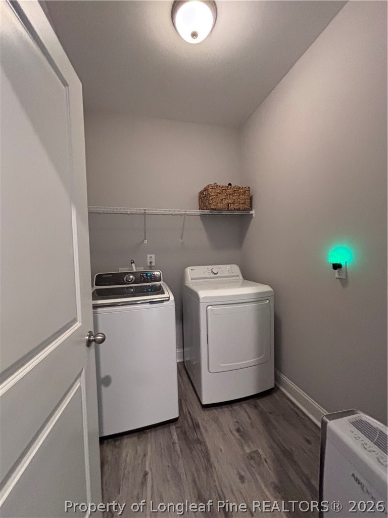 7720 Rufus Johnson Road Fayetteville, NC 28306 - Photo 12 of 50 a utility room with dryer and washer