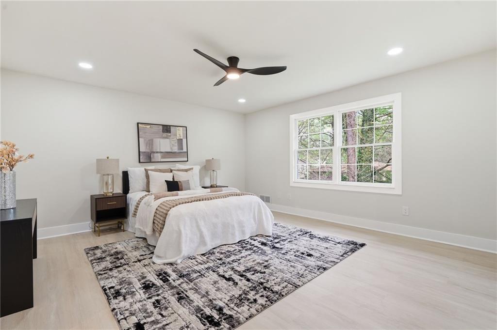 4158 Marist Court Decatur, GA 30034 - Photo 22 of 34 a bedroom with a large bed and a window