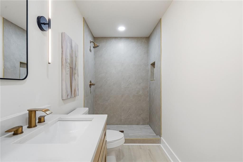 4158 Marist Court Decatur, GA 30034 - Photo 25 of 34 a bathroom with a sink a toilet and shower