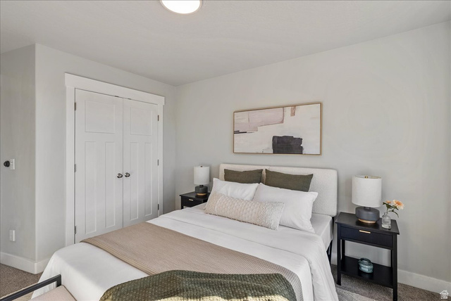 882 Spring Dew Lane Lehi, UT 84048 - Photo 38 of 46 Bedroom featuring carpet and a closet