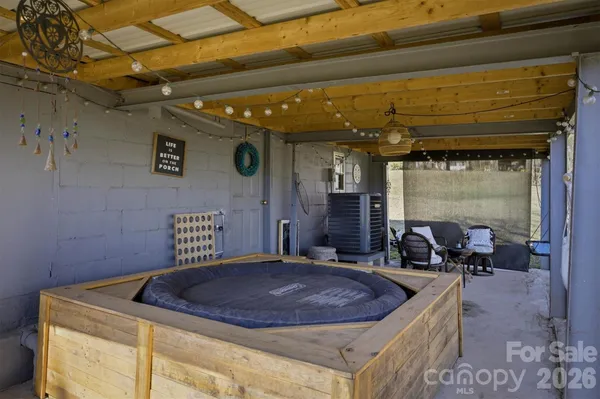 a dinning room with a table and chairs