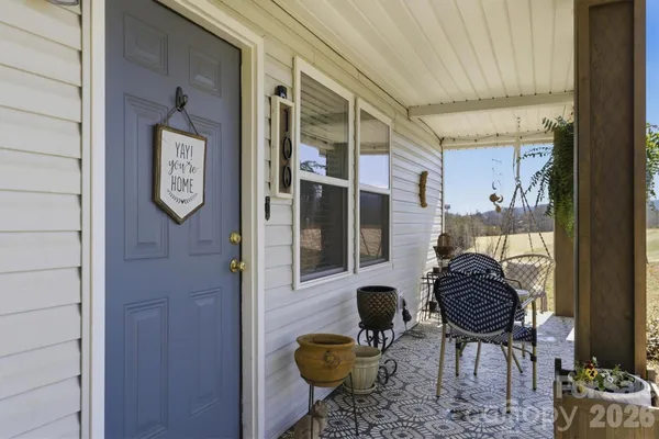 a view of entryway dining area and chandelier