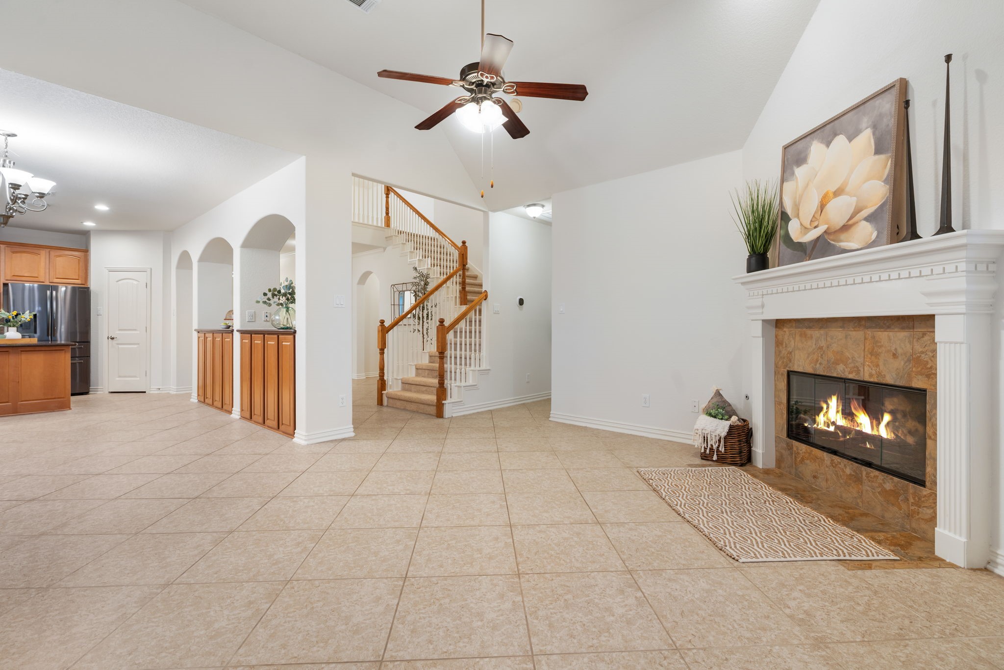 307 Arbor Ridge Lane Conroe, TX 77384 - Photo 11 of 50 a view of an empty room with a fireplace
