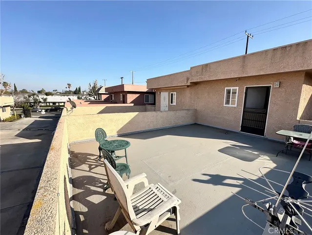 a view of a patio with swimming pool
