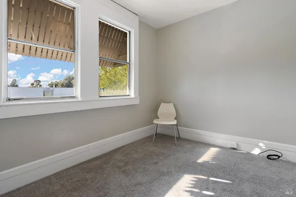 a living room with a chair