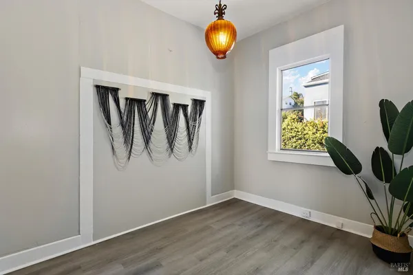 a view of entryway with wooden floor