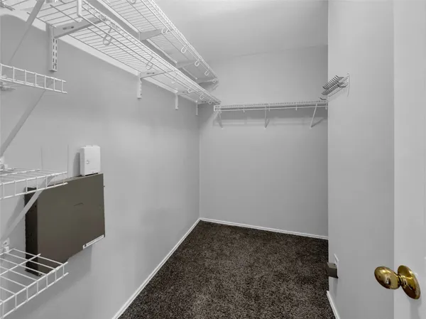 a view of a room with racks on the wall