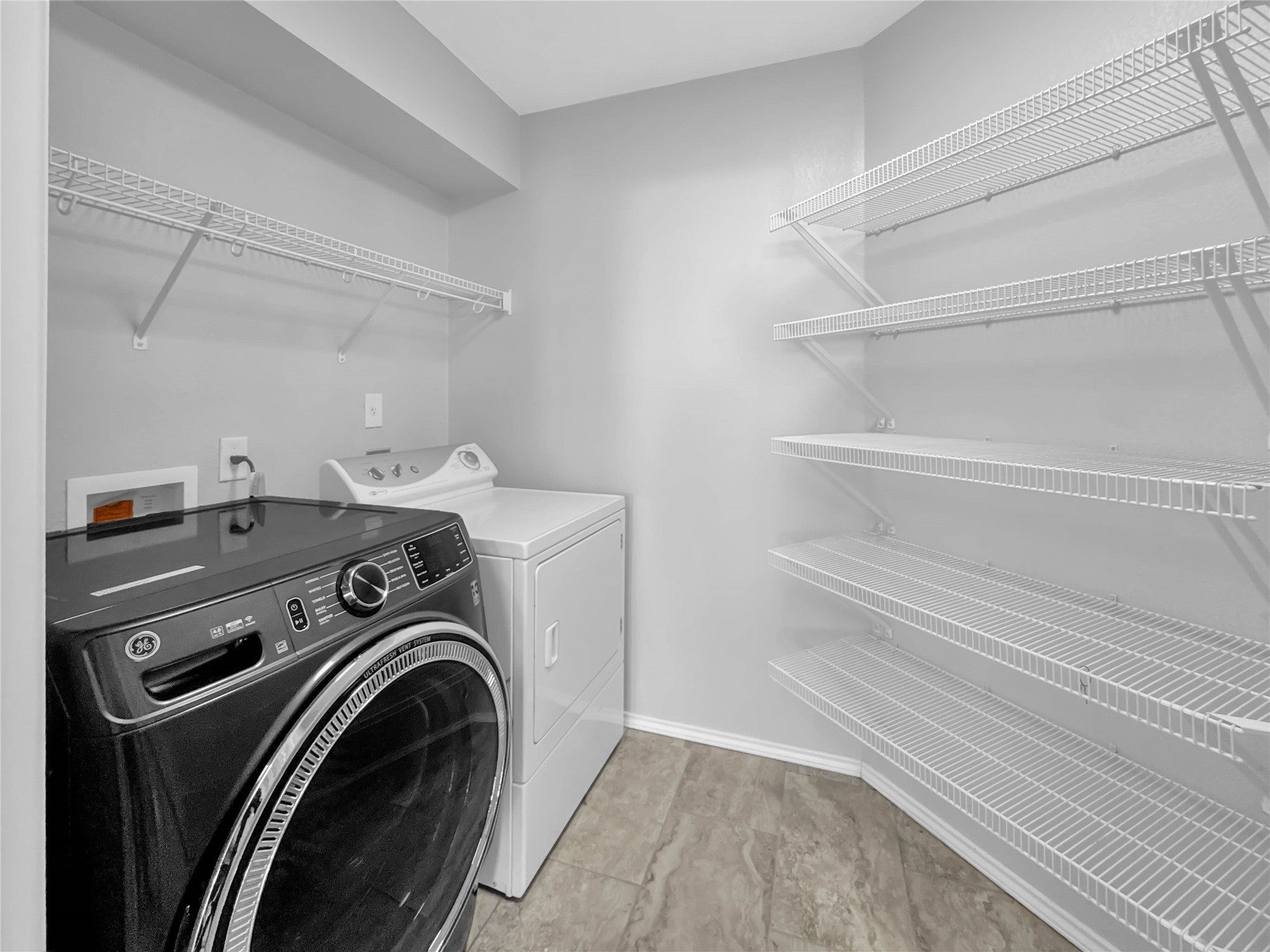 1032 Tudor House Road Pflugerville, TX 78660 - Photo 20 of 32 a utility room with dryer and washer
