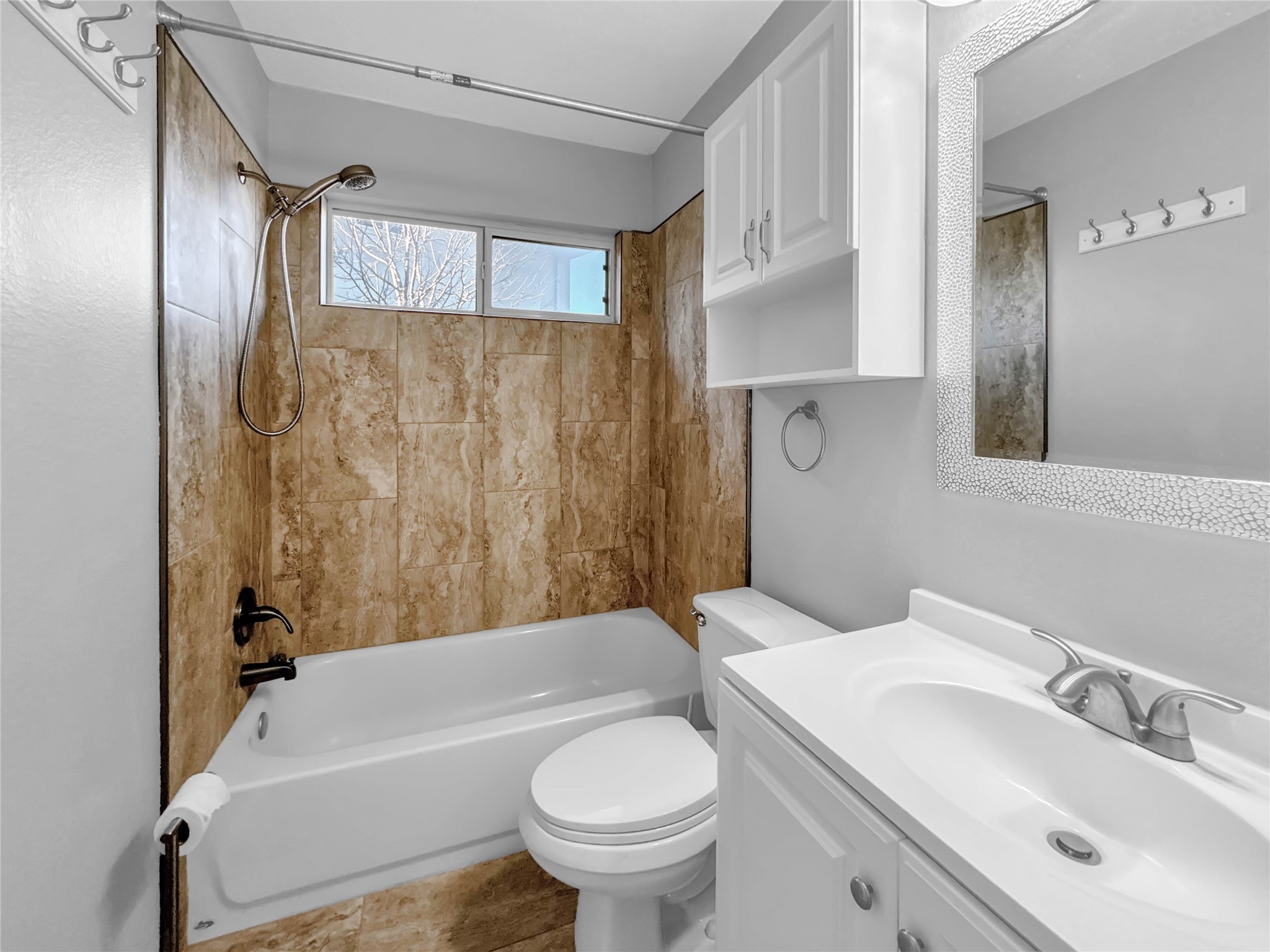 1032 Tudor House Road Pflugerville, TX 78660 - Photo 27 of 32 a bathroom with a sink toilet and shower