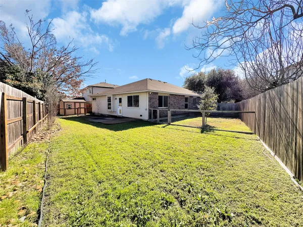 a view of a house with a swimming pool