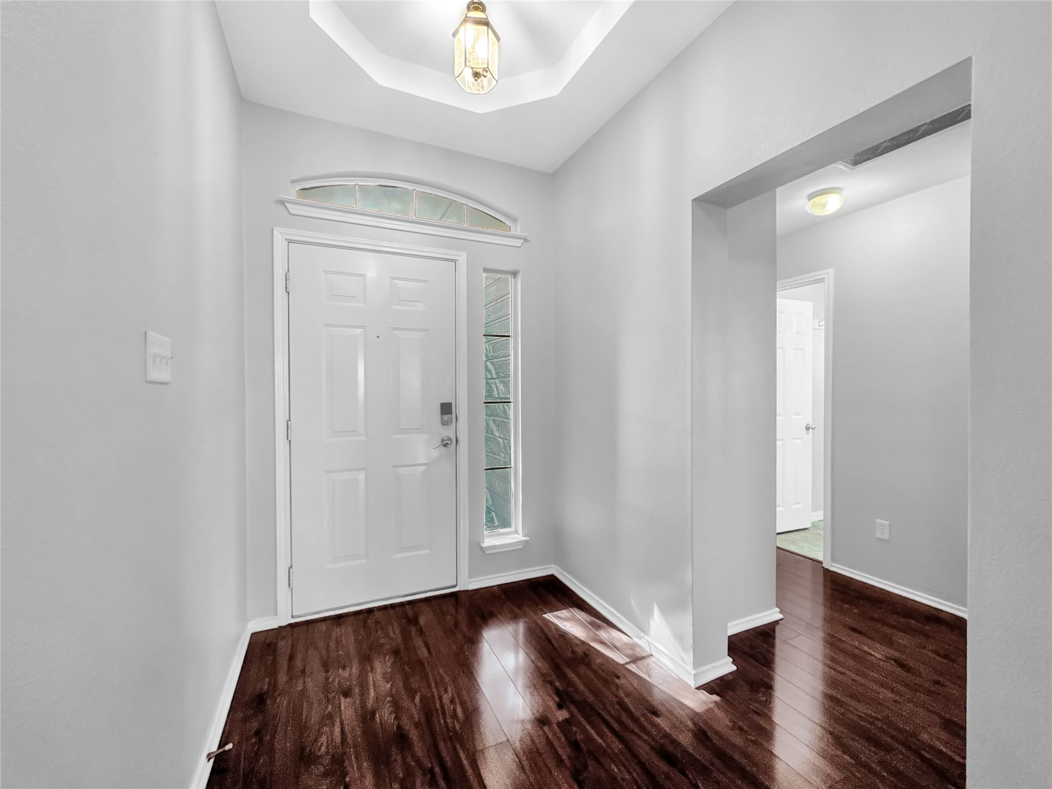 1032 Tudor House Road Pflugerville, TX 78660 - Photo 7 of 32 a view of hallway with wooden floor