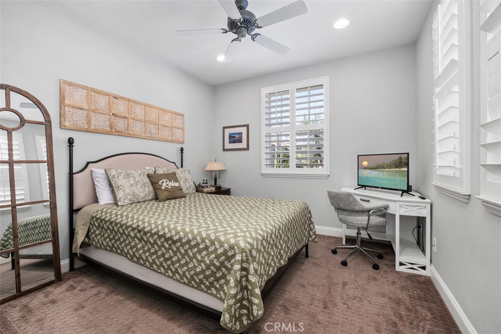 20 Bentley Road Coto de Caza, CA 92679 - Photo 13 of 29 a bedroom with a bed and a desk