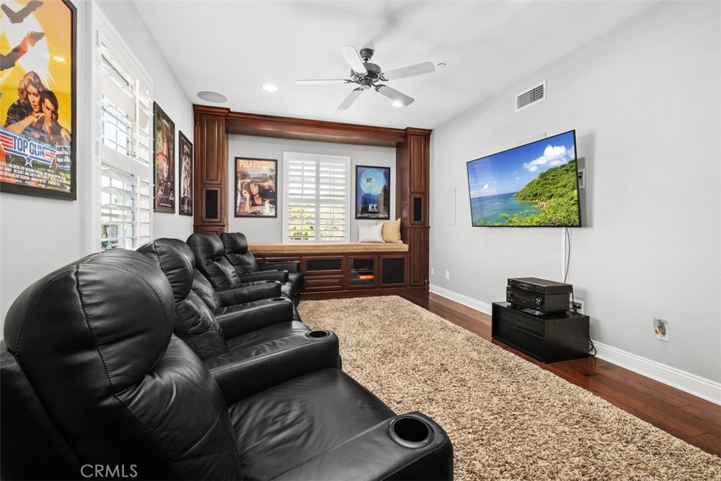 20 Bentley Road Coto de Caza, CA 92679 - Photo 17 of 29 a living room with furniture and a flat screen tv