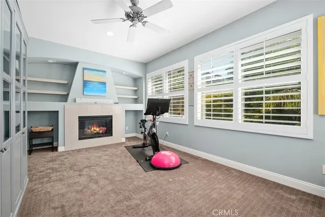 a view of backyard with swimming pool and furniture