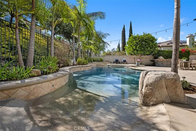 a outdoor living space with furniture and a potted plant