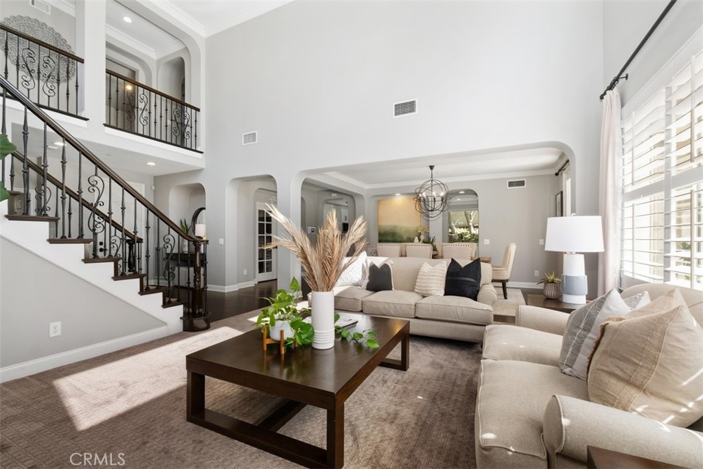 20 Bentley Road Coto de Caza, CA 92679 - Photo 6 of 29 a living room with furniture and a chandelier