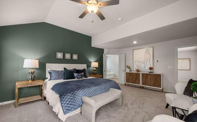 1260 Riverstone Road Jonesboro, GA 30236 - Photo 27 of 45 a bedroom with a bed and a chandelier